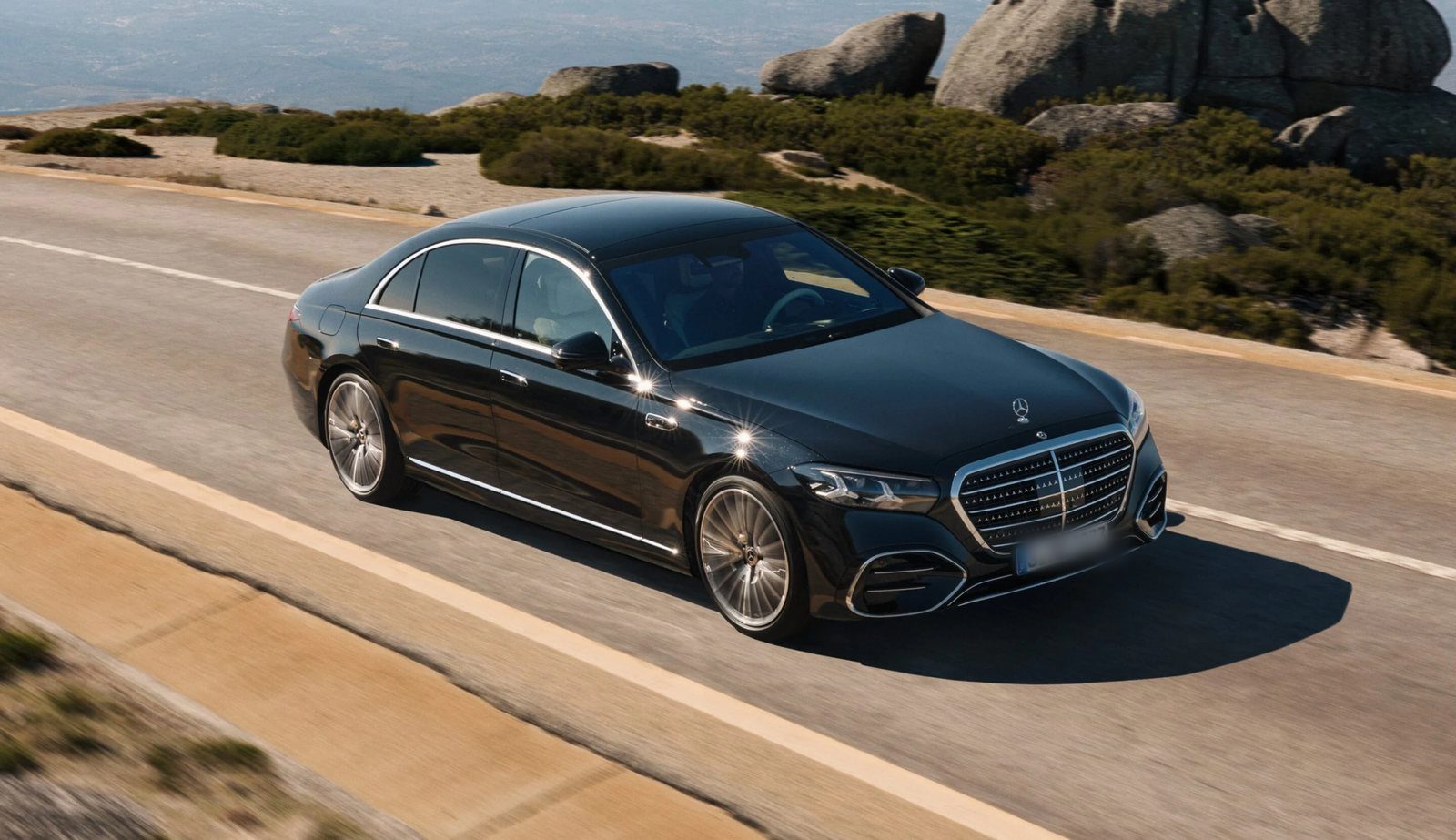 Chauffeured Mercedes-Benz S-Class on the open road